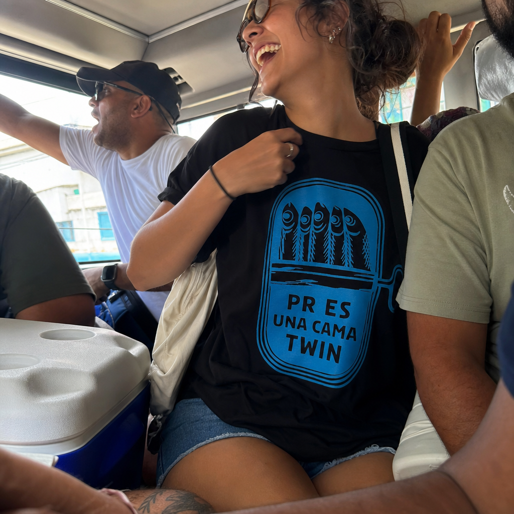Puerto Rican adult wearing Sardine Can Humor T-Shirt in a relaxed creative setting