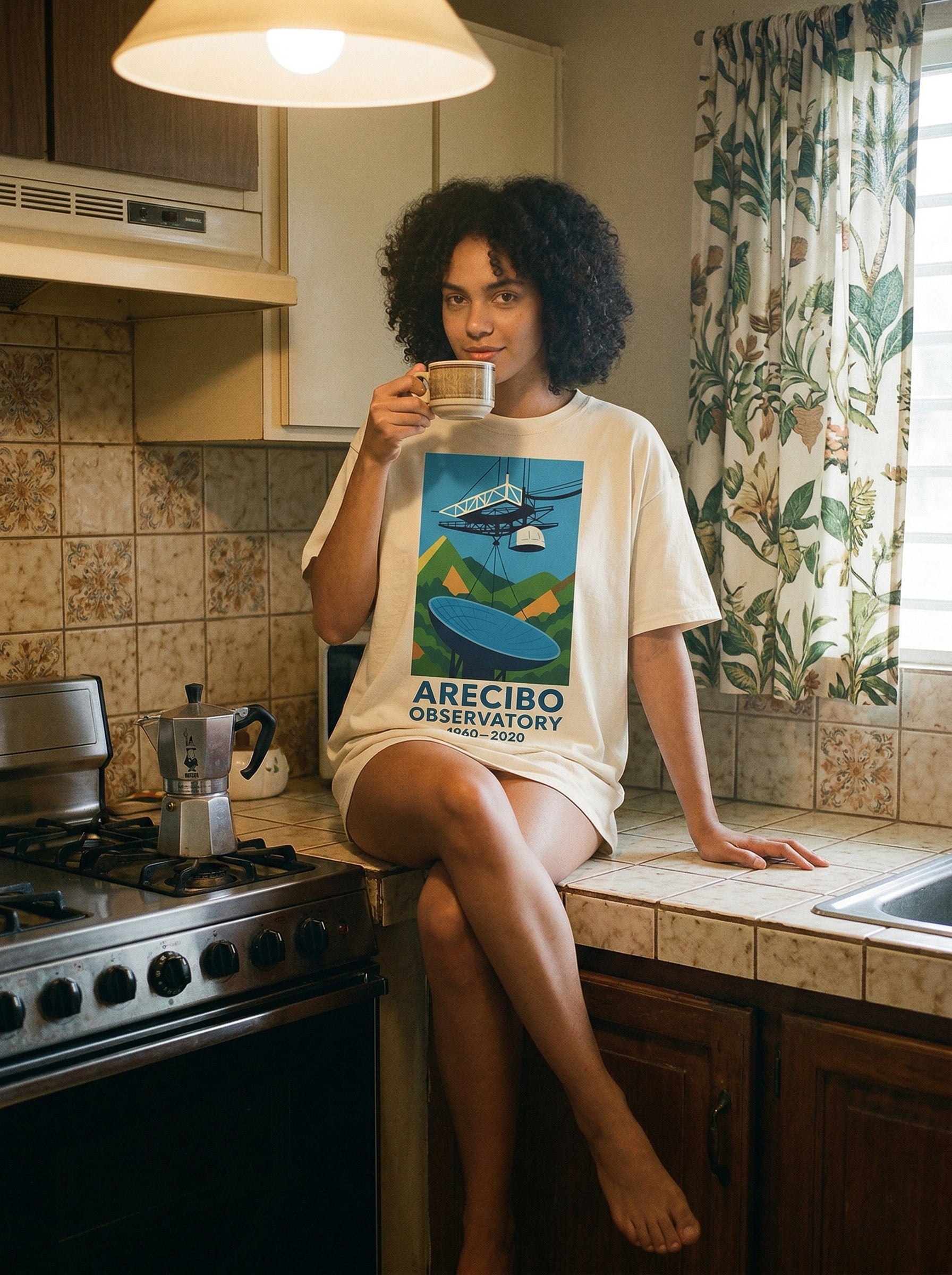 ARECIBO OBSERVATORY 1960–2020 T-Shirt — arecibo-observatory-1960-2020--lifestyle-a-kitchen-counter-perch
