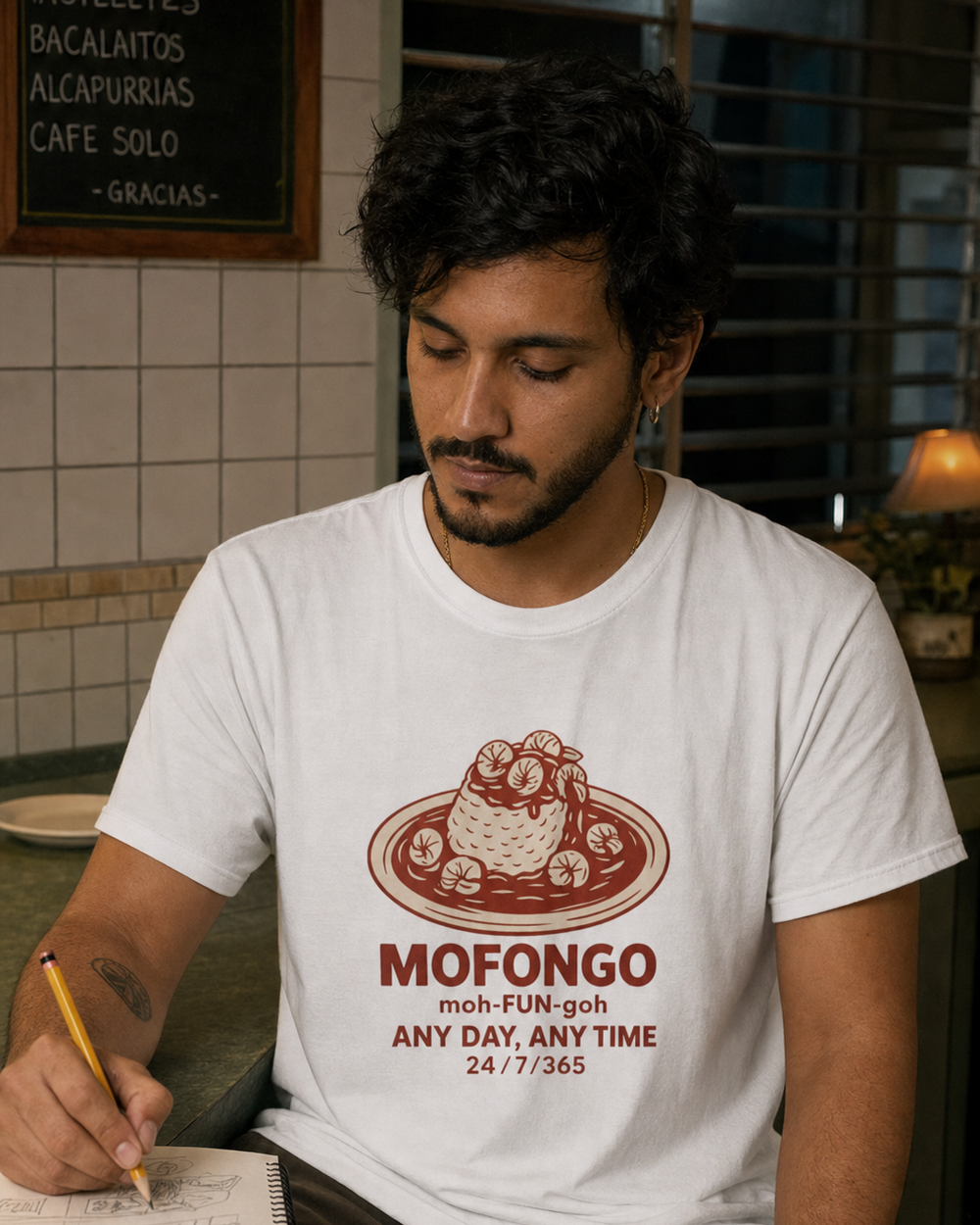 Puerto Rican adult wearing MOFONGO ANY DAY, ANY TIME in a relaxed creative setting