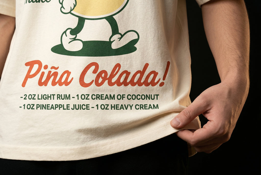 Piña-Gal Piña Colada T-Shirt — pi-a-gal-pi-a-colada-t-shirt-studio-05-hem-hand