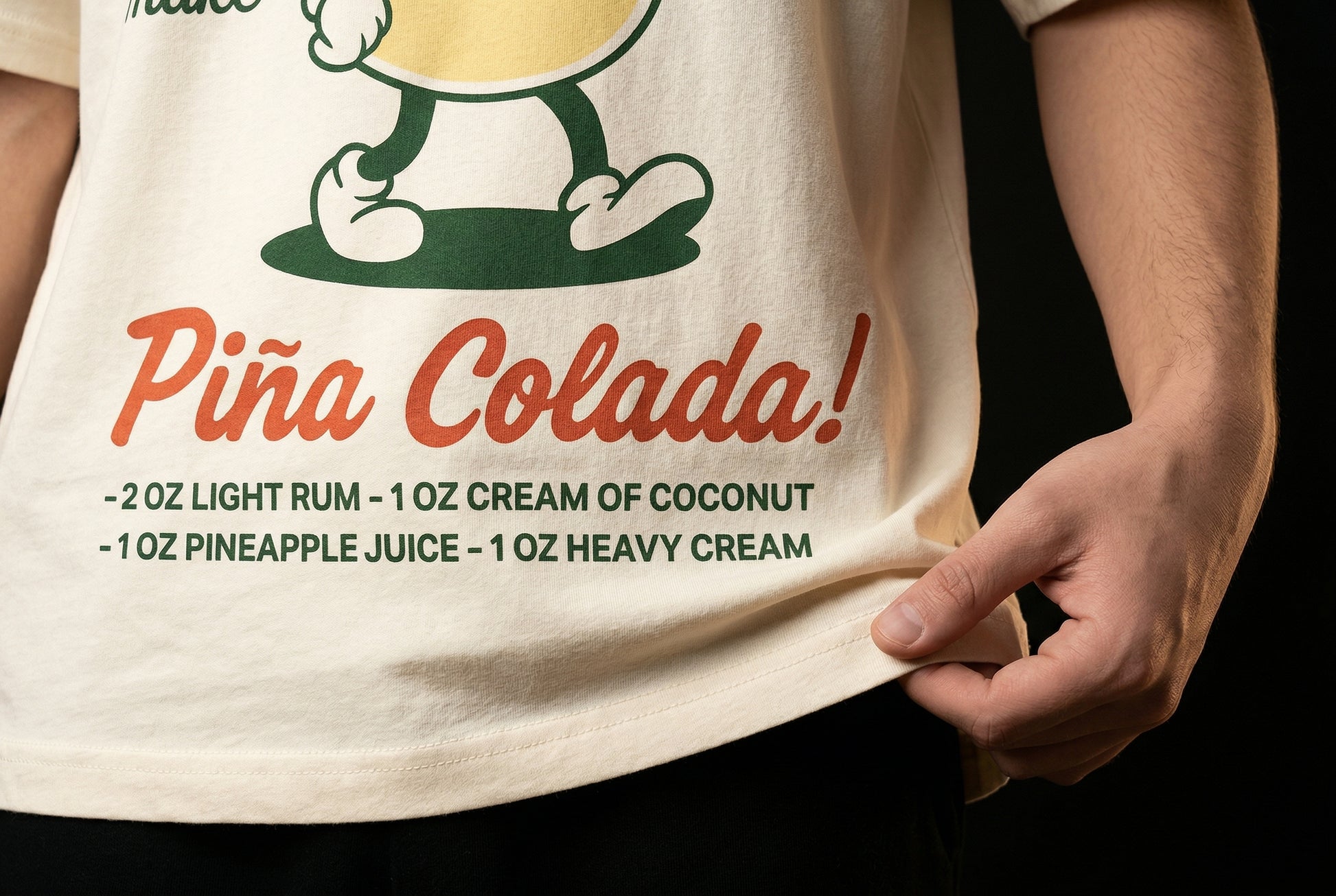 Piña-Gal Piña Colada T-Shirt — pi-a-gal-pi-a-colada-t-shirt-studio-05-hem-hand