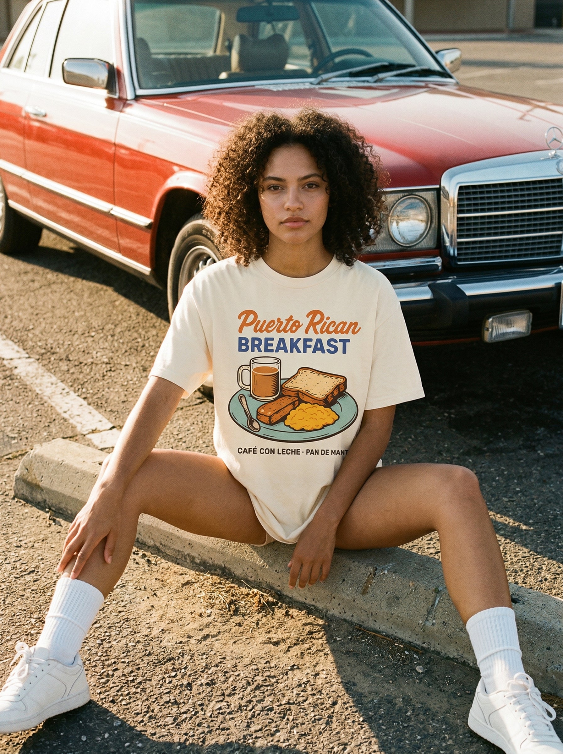 Puerto Rican Breakfast T-Shirt — puerto-rican-breakfast-t-shirt-lifestyle-b-seated-curb-laugh