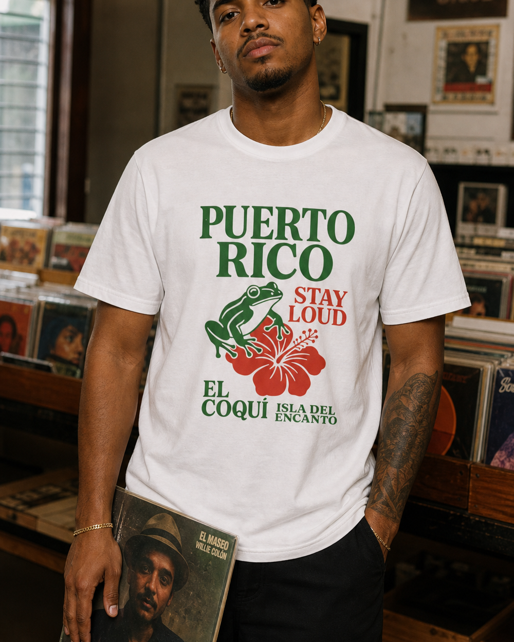 Puerto Rican adult wearing PUERTO RICO STAY LOUD in a relaxed creative setting