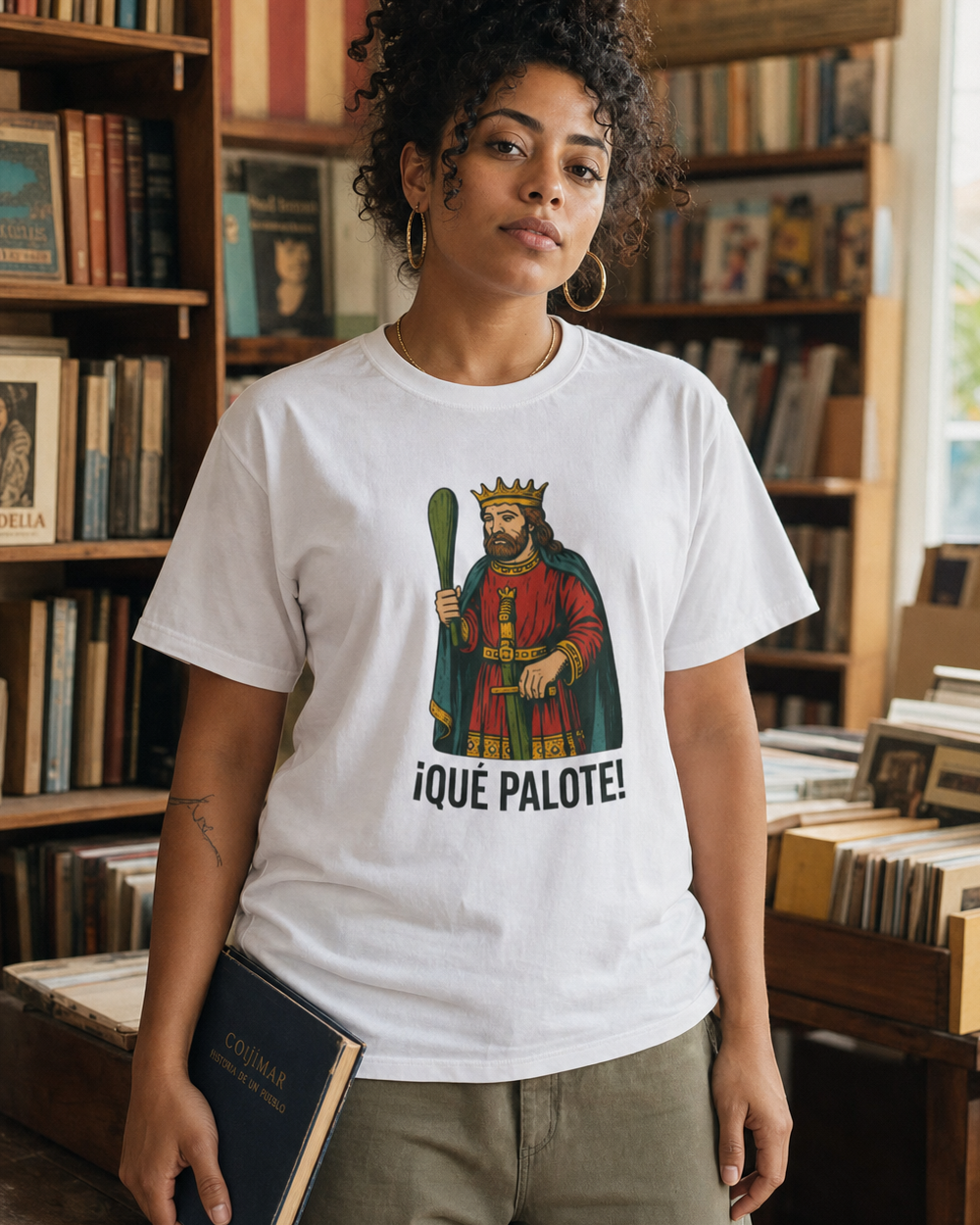 Puerto Rican adult wearing ¡QUÉ PALOTE! in a relaxed creative setting
