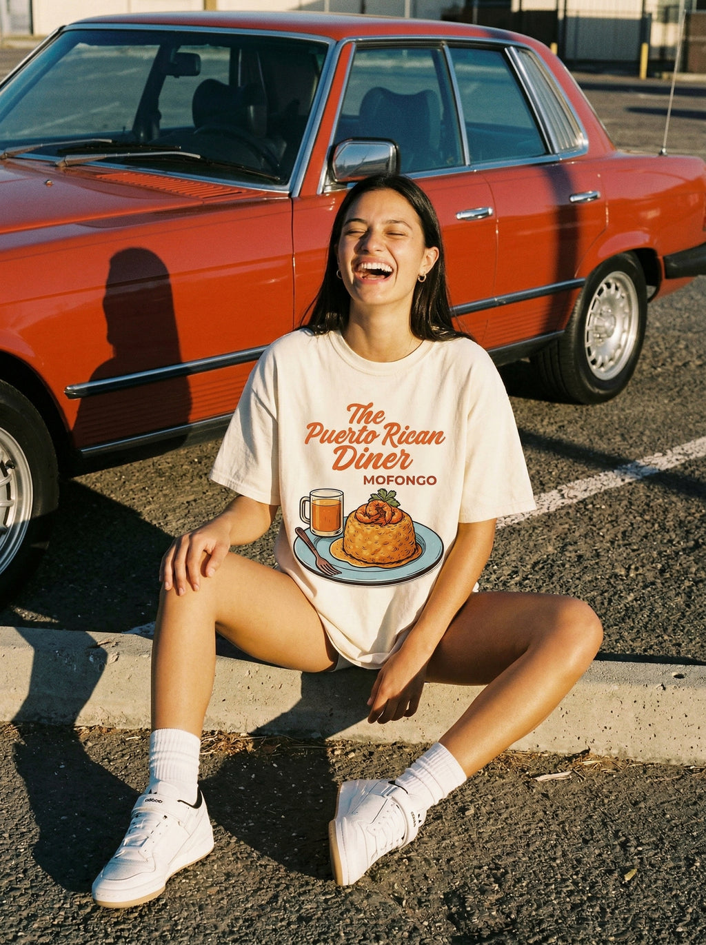 The Puerto Rican Diner Mofongo — the-puerto-rican-diner-mofongo-lifestyle-b-seated-curb-laugh